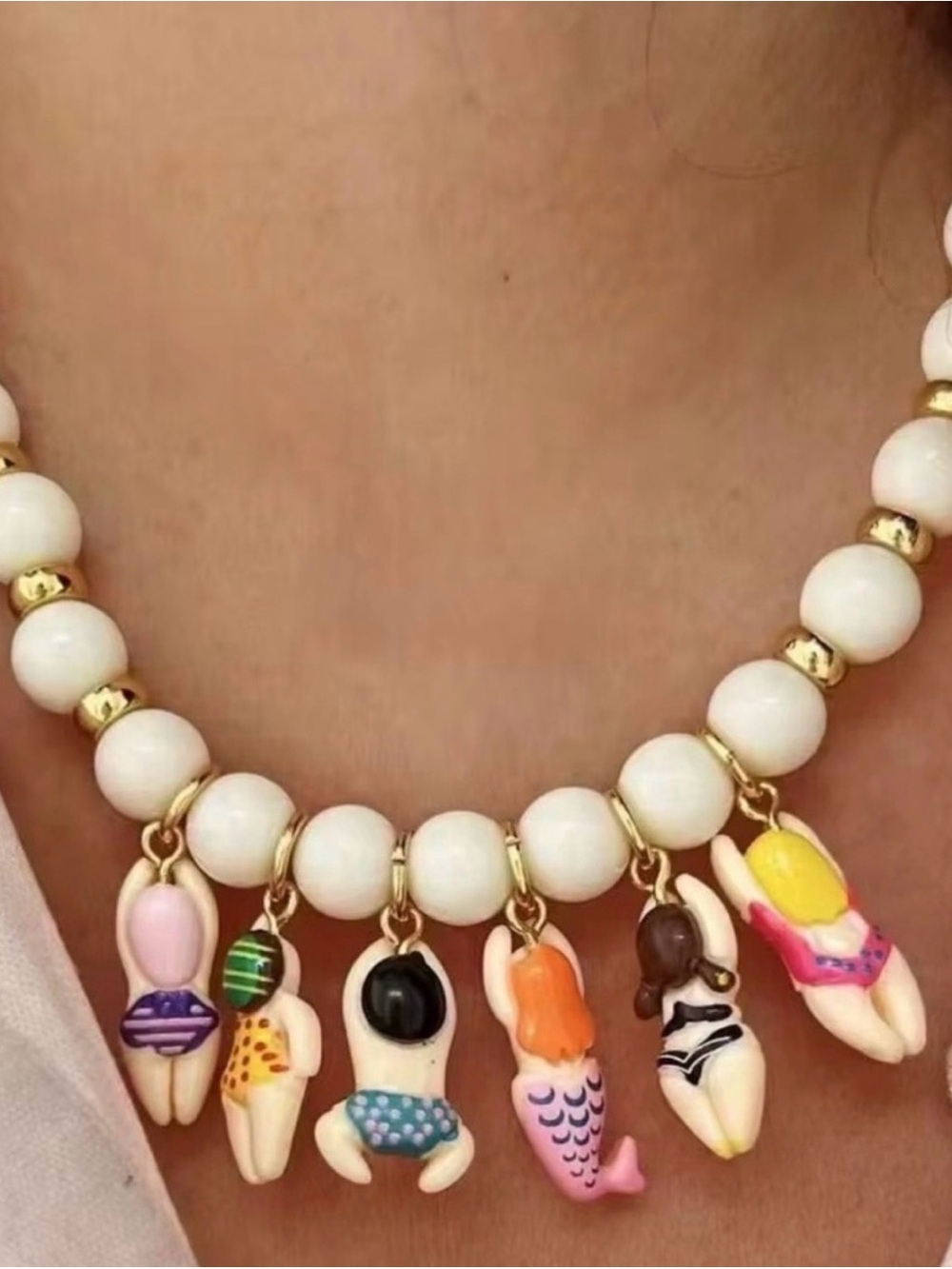 Anthropologie White Beaded Necklace with Colorful Swimmer & Mermaid Charms